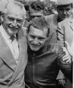 Mike with his father Stan after winning the 125 cc class on Man, 1961