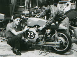 Tom Phillis in the Isle of Man with the RC161 and a mechanic.